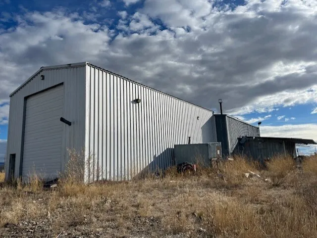 Steel warehouse with a large roll-up door